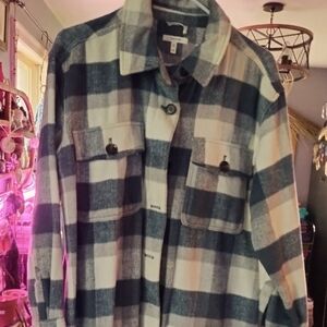 Plaid button up jacket, size M. Will fit a Large. Has pockets. No flaws.